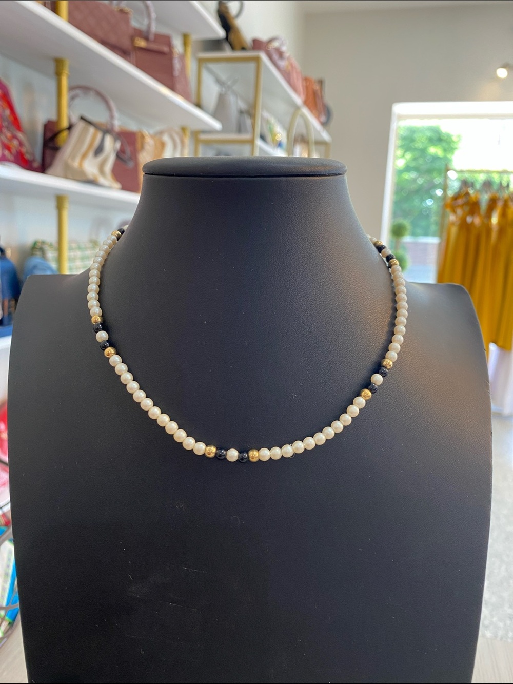 Elegant Pearl Style and Black Bead Necklace with Gold Accents